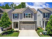 Charming two-story home with stone accents, attached two-car garage and nicely landscaped front yard at 550 Constellation Overlook Sw, Atlanta, GA 30331