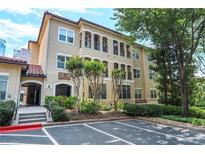 Charming condo building with well-maintained landscaping and assigned parking spaces for residents at 955 Juniper Ne St # 3331, Atlanta, GA 30309
