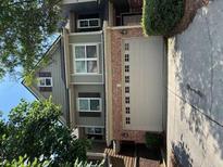 Charming two-story home featuring a brick facade and a two-car garage in a desirable neighborhood at 1629 Marsanne Ter, Kennesaw, GA 30152