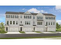 Charming townhome with gray brick, black shutters, and a one-car garage at 6137 Wayburn St, Tucker, GA 30084