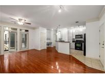 Spacious open concept living area with hardwood floors and updated kitchen at 400 17Th Nw St # 2308, Atlanta, GA 30363