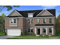 Charming two-story brick home features a traditional design with a two-car garage and well-maintained landscaping at 2516 Cadenza Cir, Dacula, GA 30019