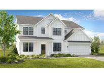 Beautiful new construction two-story home with white siding, black framed windows, and well-manicured front yard at 5415 Trescott Path, Cumming, GA 30028