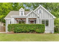 Charming craftsman home featuring a cozy front porch and manicured landscaping at 764 Stokeswood Se Ave, Atlanta, GA 30316