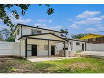 Expansive backyard featuring a covered patio, perfect for outdoor entertaining and relaxation at 2403 Tiffany Pl, Decatur, GA 30035
