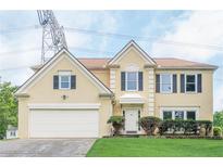 Charming two-story home featuring a two-car garage and well-manicured front lawn with sunny exposure at 2794 Craig Ct, Marietta, GA 30062