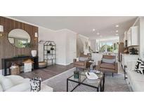 Bright living room features modern furnishings, stylish decor, and an open layout at 224 College Cir # 1013, Hapeville, GA 30354