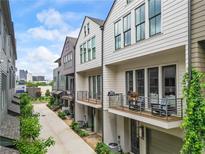 Modern townhome exteriors feature balconies and meticulous landscaping, creating a welcoming neighborhood feel at 658 Bull Se St, Atlanta, GA 30315