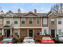 Charming townhome with diverse facade, well-maintained landscaping, and convenient front parking at 2850 Vining Ridge Ter, Decatur, GA 30034