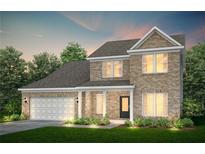 Inviting two-story brick home featuring an attached two-car garage and a well-manicured front lawn at 3095 Newell Dr Dr, Dacula, GA 30019