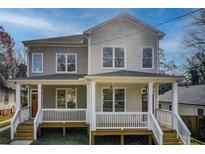 Charming craftsman style duplex with inviting front porches and classic design at 1240 Oakland Sw Ter # B, Atlanta, GA 30310