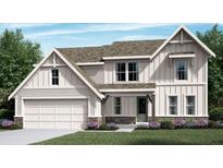 Charming two-story home featuring a clean white exterior, a two-car garage, and a welcoming front porch at 166 Willow Bend Rd, Hiram, GA 30141