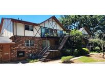Charming two-story apartment building with brick facade and Tudor-style accents at 1225 Church St # G, Decatur, GA 30030