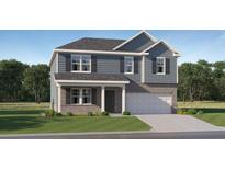 Charming two-story home with blue siding, gray brick, and a well-manicured front lawn at 221 Paisley Way, Locust Grove, GA 30248