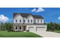 Charming two-story home with a brick facade, three-car garage, covered porch, and neatly manicured lawn at 7048 Foundry Dr, Woodstock, GA 30188
