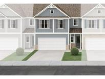 Charming blue two-story townhouse with attached garage and well-manicured front lawn at 422 Lanier Cir, Woodstock, GA 30189