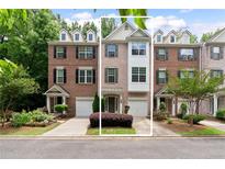 Charming brick townhome with a well-manicured front yard and an attached garage at 651 Coligny Ct, Atlanta, GA 30350