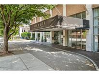 View of the building entrance featuring a covered awning, Windsor Over Peachtree, and 620 Peachtree Street Address at 620 Peachtree Ne St # 911, Atlanta, GA 30308