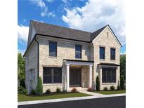 Two-story brick home featuring black window frames, dark roof, and a well-manicured front lawn at 114 Cottage Gate Ln, Roswell, GA 30076