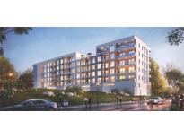 A modern multi-story building with balconies, offering a blend of urban living and outdoor space at 525 Parkway Ne Dr # 306, Atlanta, GA 30308