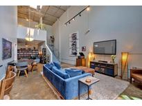 Spacious living room with high ceilings and modern decor, great for entertaining and relaxing at 195 Arizona Ne Ave # 199, Atlanta, GA 30307