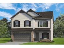 Charming two-story home featuring brick accents, gray siding, and black shutters at 146 Silver Leaf Trce, Douglasville, GA 30134