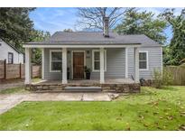 Charming single-story home with a welcoming front porch and well-maintained lawn at 361 Adelle Se St, Atlanta, GA 30315