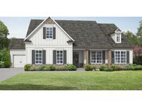 Charming single Gathering home with a covered porch, a brick foundation, and a well-manicured lawn at 1297 Pj East Rd, Covington, GA 30014