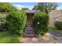 Charming home with a covered entrance and mature landscaping at 1143 Westview Sw Dr, Atlanta, GA 30310