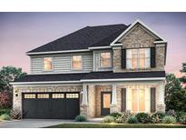 Two-story home featuring a brick and siding exterior with black shutters and a two-car garage at 4660 Rosarian Drive, Cumming, GA 30040