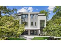 Stunning modern home with gray siding, white brick accents and black trim at 81 Walthall Se St, Atlanta, GA 30316