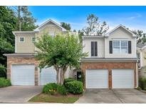 Charming townhome with attached garages and manicured landscaping in a quiet neighborhood at 2263 Nottley Dr # 2, Marietta, GA 30066