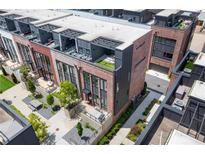 Stunning aerial view of brick townhomes featuring private rooftop terraces and meticulous landscaping at 1244 Chelsea Nw Cir, Atlanta, GA 30318