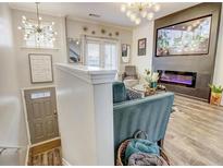 Comfortable living room featuring a modern fireplace, stylish decor, and plenty of natural light at 1753 Liberty Pkwy, Atlanta, GA 30318