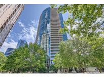 Stunning high-rise condo building with modern architecture and lush landscaping at 3338 Peachtree Ne Rd # 1507, Atlanta, GA 30326