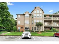 Exterior of the building with well-kept lawn and parking spaces at 719 Mcgill Park Ne Ave, Atlanta, GA 30312