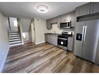 Modern kitchen featuring stainless steel appliances and updated cabinetry at 405 Fairburn Sw Rd # 231, Atlanta, GA 30331