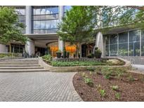 Sovereign Residences entrance featuring landscaped walkway, signage and modern architecture at 3344 Peachtree Ne Rd # 3504, Atlanta, GA 30326