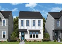 Charming two-story home featuring white siding, black roof, and a delightful turquoise front door at 3023 Greco Place, Decatur, GA 30033