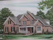 Illustration of a brick two-story home with white trim, black shutters, and mature trees at 2883 Thurleston Ln, Duluth, GA 30097