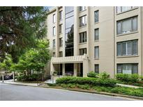 Well-maintained building featuring a landscaped entrance and manicured greenery surrounding the property at 2769 Peachtree Ne Rd # 7, Atlanta, GA 30305