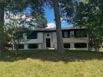 Charming home featuring a well-maintained front yard and classic architectural details at 2475 Cajun Dr, Marietta, GA 30066