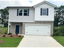 Charming two-story home with a two-car garage and blue shutters at 119 Deer Xing, Temple, GA 30179