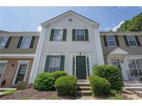 Charming townhome with well-maintained landscaping and inviting front entrance at 3497 Mount Vernon Cir, Atlanta, GA 30340