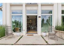 Welcoming front entrance featuring a modern door, large windows, and stylish decor that invites you into the home at 100 5Th St, Fayetteville, GA 30214