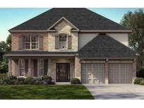Charming two-story home with stone accents, a well-manicured lawn, and a two-car garage at 3715 Near Star Ln, Cumming, GA 30028