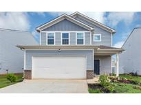 Charming two-story home with a two car garage and a well-maintained front yard at 109 Paulownia Cir, Mcdonough, GA 30253