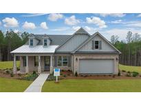 Charming single-story home with brick facade, covered porch, and well-manicured lawn in a desirable community at 782 Brooke View Drive, Canton, GA 30115