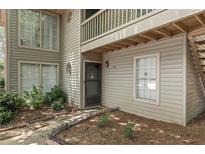 Charming two-story home with a cozy front entry and well-maintained landscaping at 1362 Brockett Pl, Clarkston, GA 30021