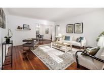 Bright living room features hardwood floors, a large rug, and stylish furniture at 425 Lindbergh Ne Dr # A2, Atlanta, GA 30305